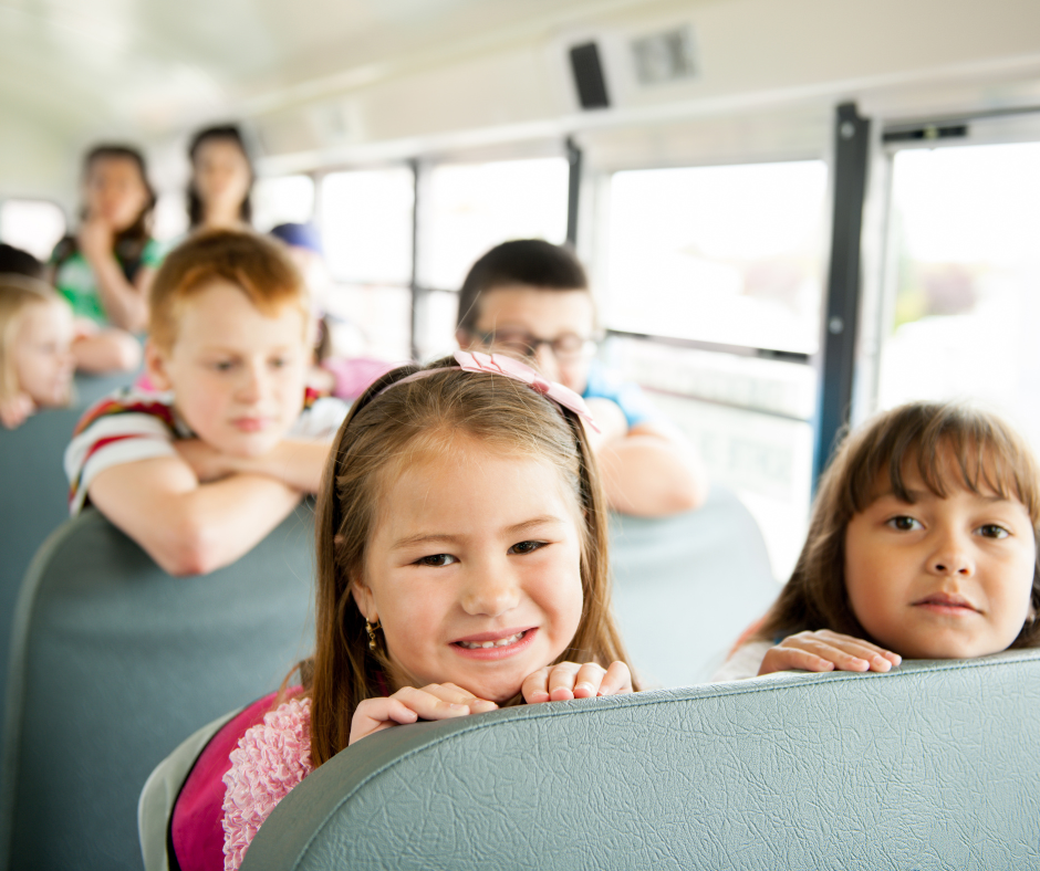 a group of children on a bus
